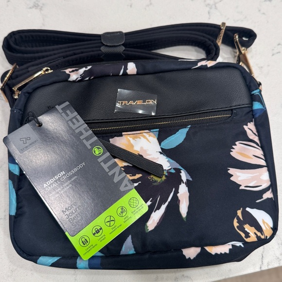 Travelon Anti-Theft Addison Small Crossbody travel bag key clip with LED light - Picture 12 of 16